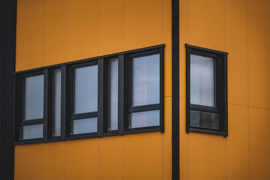 Modern black window frame expertly installed